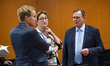 (L-R) Prime Minister of Schleswig-Holstein Daniel Guenther talks with German Minister for...