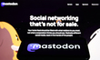 Mastodon logo displayed on a phone screen and Mastodon website displayed on a screen in th...