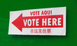 A sign is seen directing people to attend in-person early voting at the West End Public Li...