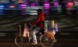 A street food vendor selling coffee on a street in Jakarta on 13 November 2022. Indonesia'...