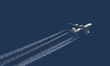 Emirates Airbus A380 double decker passenger aircraft as seen flying in the blue sky over...