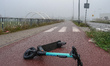 Shared Tier electric scooter thrown in the middle of the bike path is seen in Gdansk, Pola...