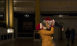 A mother with a Santa Claus hat plays with her son in one of the rooms open to the public...