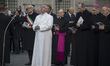 Pope Francis looks at the statue of the Virgin Mary during the annual feast of the Immacul...