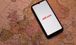 In this photo illustration a Jet2.com airlines logo seen displayed on a smartphone screen...