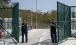 Workers closing the gates of penny bay during the Closing Ceremony of Penny's Bay Communit...