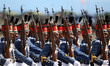 Soldiers march during a parade in celebration of the 80th founding anniversary of the Arme...