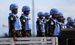 Photo taken on Dec. 21, 2015 shows U.N. peacekeepers on a military truck during a parade i...