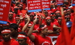 Garment workers & other labor organization in Bangladesh shout slogans during the May day...
