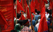 Garment workers & other labor organization in Bangladesh shout slogans during the May day...