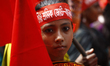 Garment workers & other labor organization in Bangladesh shout slogans during the May day...