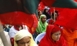 Garment workers & other labor organization in Bangladesh shout slogans during the May day...