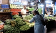 A vegetable market area in Mumbai, India, 09 March, 2023. India GDP growth slows down to 4...