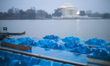 The Jefferson Memorial is seen beyond paddle boats at the Tidal Basin in Washington, D.C....