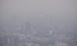 An aerial view of cityscape engulfed in smog amid hazy weather in Colombo on March 11, 202...