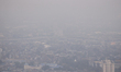 An aerial view of cityscape engulfed in smog amid hazy weather in Colombo on March 11, 202...