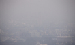 An aerial view of cityscape engulfed in smog amid hazy weather in Colombo on March 11, 202...