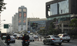 Heavy air pollution of fine particulate matter (PM2.5) shrouds a street in Bangkok, Thaila...