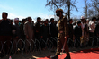 Jammu Kashmir Police Cop stands alert as people listen to Former J&K chief minister, and c...