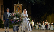 Falleros dressed up in traditional costume enter the Plaza de la Virgen to offer flowers t...