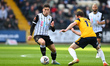 Rben Rodrigues of Notts County under pressure from Jim Kellermann of Woking during the Van...