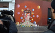 Floral tributes at a mural of David Bowie in Brixton, London, the town where he was born....