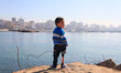 A Palestinian boy Anan AL Jaad  6 year-old, going for a walk in the Gaza port, western Gaz...