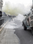 Students clash with riot police in Santiago