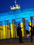 Macron And Scholz Visit Brandenburger Tor Enlightened With The Ukrainian Colors