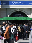 Tourists Line Up at Changchun Railway Station in Changchun.
