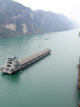 Cargo Ships Pass Through The Three Gorges of the Yangtze River in Yichang.