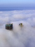 High-rise Buildings Loom in Advection Fog in Huai'an
