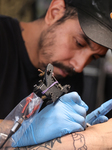 Tattoo Artist Mr Kaliman Working In A Tattoo