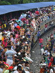 Passengers Travel On Top Of A Train In Bangladesh