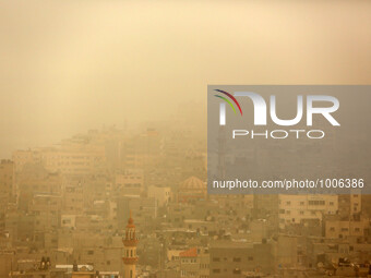 A picture taken on on January 18, 2016 shows a general view of Gaza City during a sandstorm. (