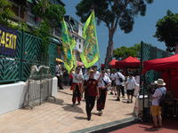 

Banner holders of a lion dance procession are entering the Cheung Chau stadium in Hong Kong, China, on May 26, 2023, the location of the t...