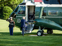 President Joe Biden boards Marine One en route to Camp David for the Memorial Day weekend. (
