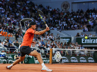 Alexandre MULLER (FRA) in action during his match against Jannik SINNER (ITA) on Philippe-CHATRIER court in The French Open Roland Garros 20...