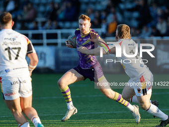 Alex Donaghy of Newcastle Thunder takes on Ebon Scurr of Bradford Bulls during the BETFRED Championship match between Newcastle Thunder and...