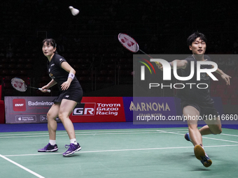 Kim Wan-ho (L) and Jeong Na-eun (R) of South Korea in action against Ye Hong Wei and Lee Chia Hsin of Taiwan during the mixed doubles semi f...