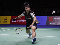 He Bing Jiao of China in action against Mia Blichfeldt of Denmark during the women's singles semi final match at the Toyota Gazoo Racing Tha...