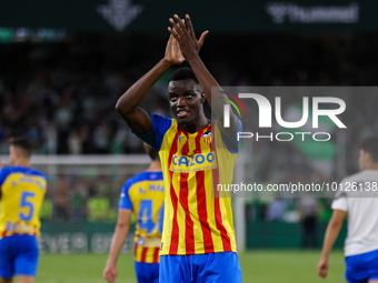 Mouctar Diakhaby of Valencia CF shows appreciation to the fans during the LaLiga Santander match between Real Betis and Valencia CF at Benit...