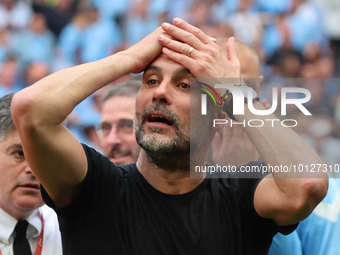 Manchester City manager Pep Guardiola  celebrates after during The Emirates FA Cup Final between Manchester City against Manchester United a...