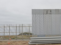 

Construction on a secondary fence at the US-Mexico border in Playas de Tijuana is advancing on Friday, June 9, 2023, as 30-foot fence pane...