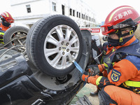 HUAI'AN, CHINA - MARCH 24, 2023 - Firefighters work during an earthquake disaster rescue drill in Huai 'an, East China's Jiangsu province, M...