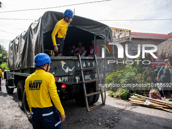 Members of the Philippine Army prepare to evacuate residents as the Mayon Volcano remains under alert level 3, in Santo Domingo, Albay provi...
