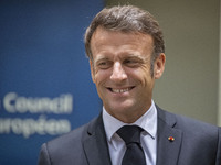 Emmanuel Macron President of the Republic of France at the Tour de Table - Round Table with a smiling face expression at the headquarters of...