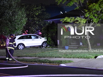 Vehicle strikes house in Hasbrouck Heights, New Jersey, United States on July 8, 2023. At approximately 12:55 AM, the fire department respon...