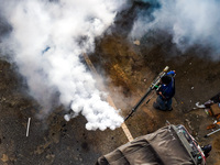 A health worker fumigates against dengue on July 28, 2023, in Colombo, Sri Lanka. Dengue fever is now an islandwide, year-round threat in Sr...