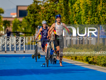 

Lasse Nygaard, a priest from Germany, is seen competing at the A Finals of the Elite Men Europe Triathlon Sprint and Relay Championships i...